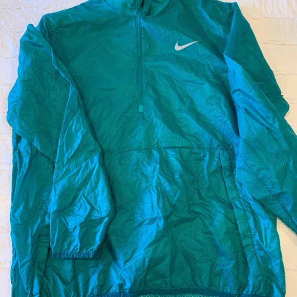 turquoise nike windbreaker